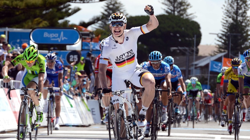 Winners are grinners ... Andre Greipel celebrates victory in stage four