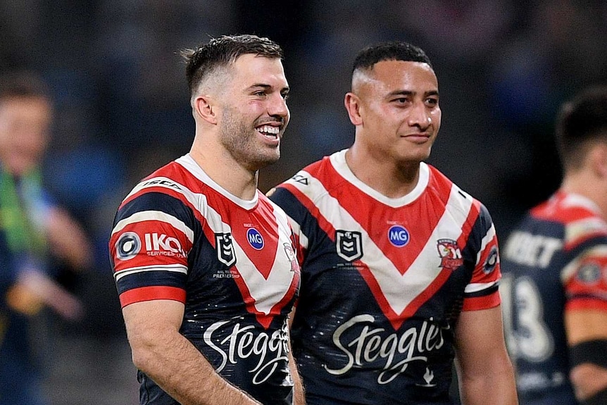 Sydney Roosters James Tedesco and Siosiua Taukeiaho smile after the NRL game against the Parramatta Eels.