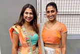 Two South Asian women dressed in traditional Indian clothing