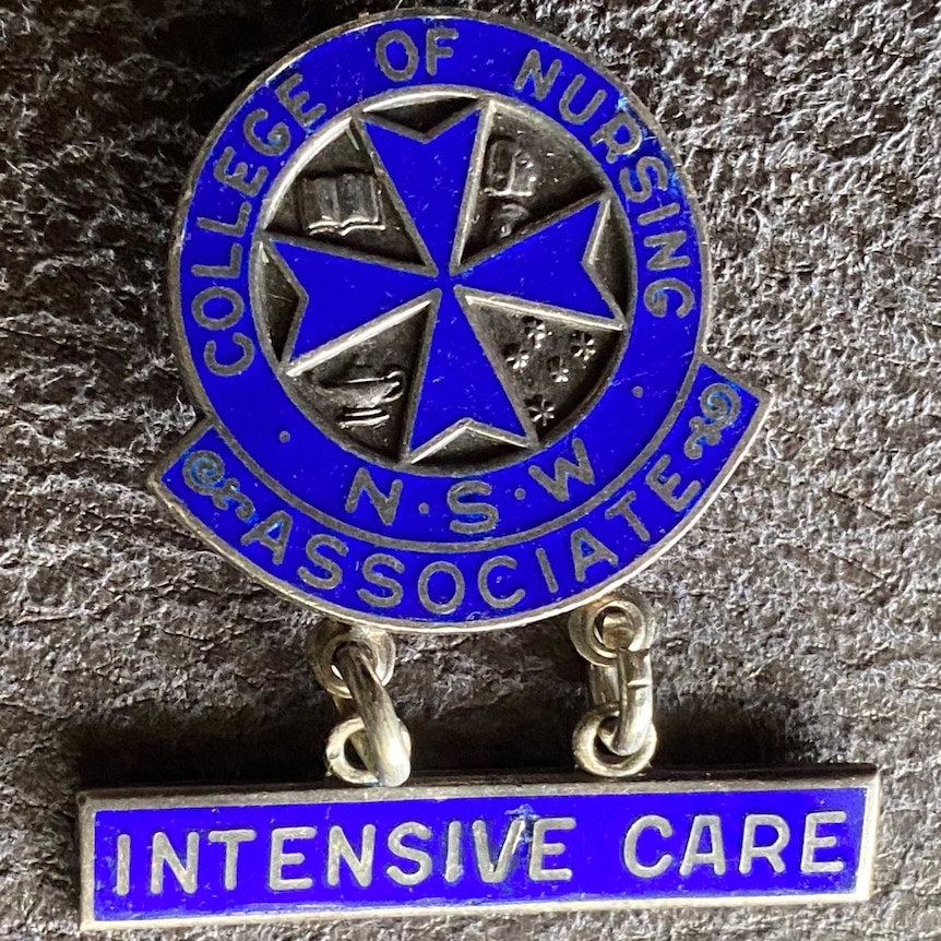 A blue badge reading College of Nursing NSW