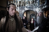 A still from The Hobbit film with elf and a wizard