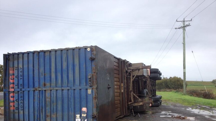 A semi-trailer toppled in strong winds near Devonport, Tasmania.