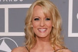 Stormy Daniels, whose real name is Stephanie Clifford, arrives for the 49th Annual Grammy Awards in Los Angeles.