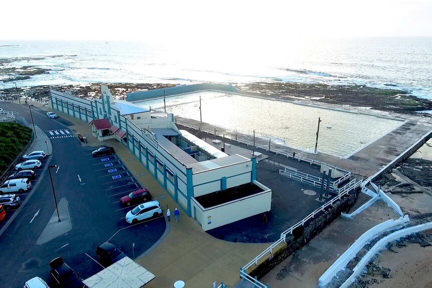Aerial view of the Newcastle Ocean Baths and facade with change rooms.