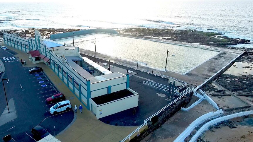 Aerial view of the Newcastle Ocean Baths and facade with change rooms.