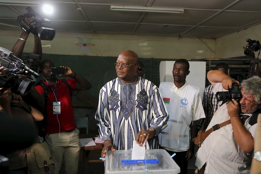 Roch Marc Kabore casts his ballot in Ouagadougou, Burkina Faso