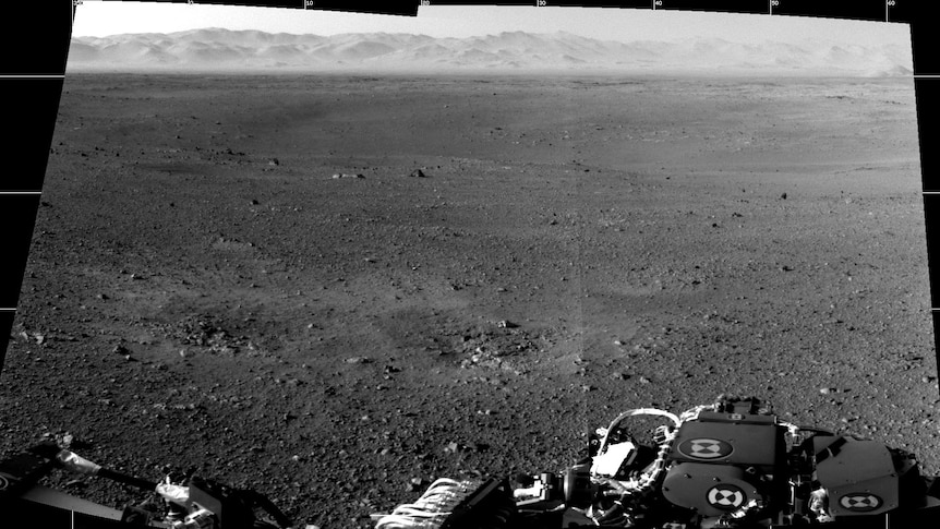 The first two full-resolution images of the Martian surface taken by NASA's Curiosity Rover.