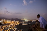 A Muslim pilgrim prays on Noor Mountain in the holy city of Mecca