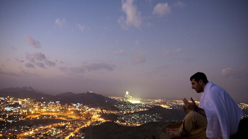 A Muslim pilgrim prays on Noor Mountain in the holy city of Mecca