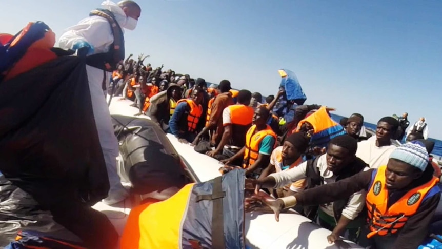 The Italian coast guard takes part in a rescue operation