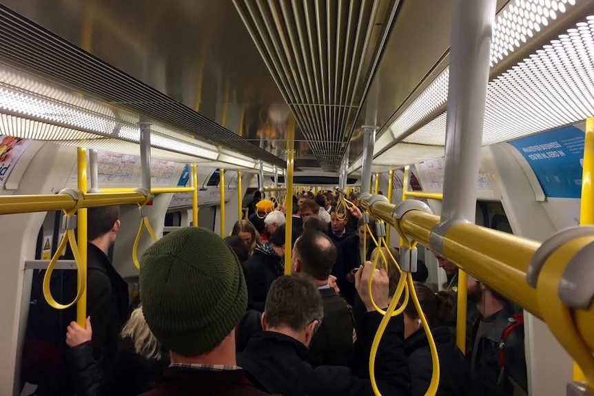 Passengers ride London's Underground