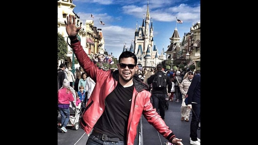 Angel Candelario-Padro poses for a photo at Disneyland
