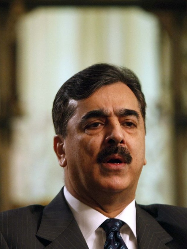 Pakistani Prime Minister Yousaf Raza Gilani speaks during an interview in Islamabad on December 13.