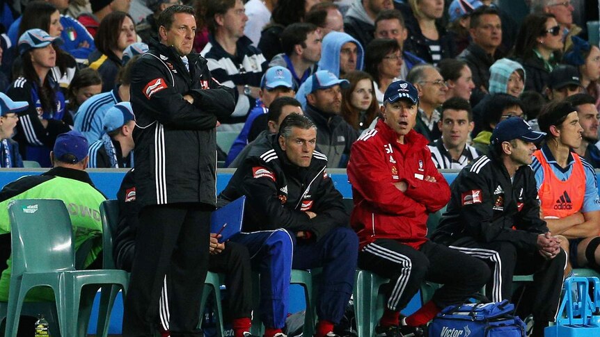 Sydney FC coach Ian Crook (L) watches during the Sky Blues' A-League loss to Newcastle.