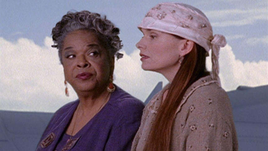 Della Reese looks at Roma Downey in a scene from Touched by an Angel.