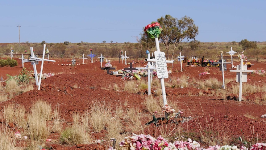 Grave markers at Balgo cemetery.