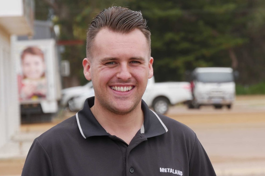 A man wearing a black shirt at Esperance in Western Australia