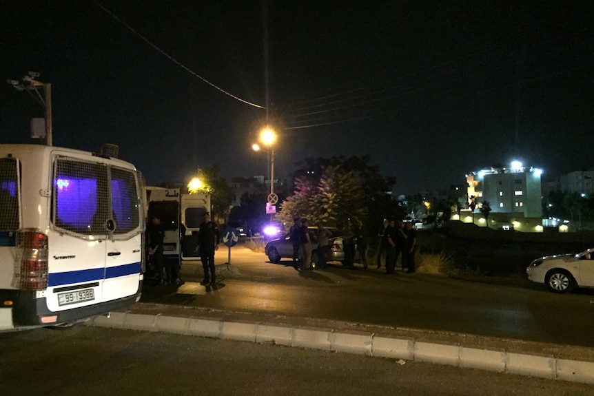 Security officials approach the Israeli embassy