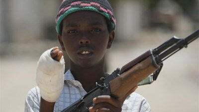 A young fighter from the Al-Shabab militia, wounded while battling Somali government forces in Mogadishu last month