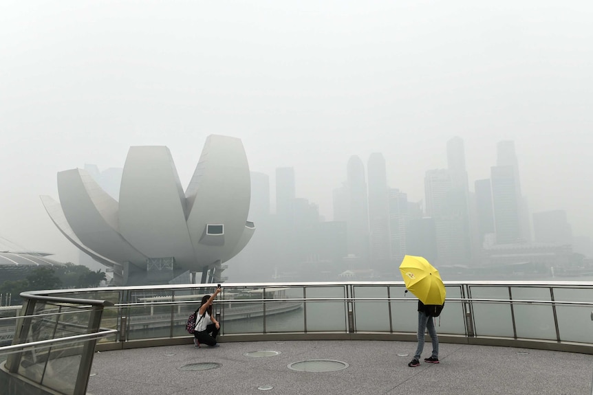 The Singapore city skyline is choked with smog from fires in neighbouring Indonesia