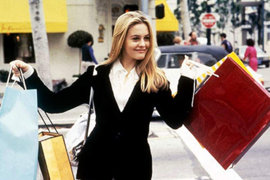 The main character from Clueless with her shopping bags