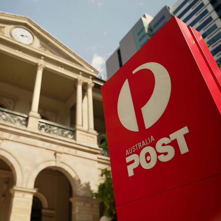 Red Australia Post sign outside Brisbane's GPO building in Queen Street in 2022.
