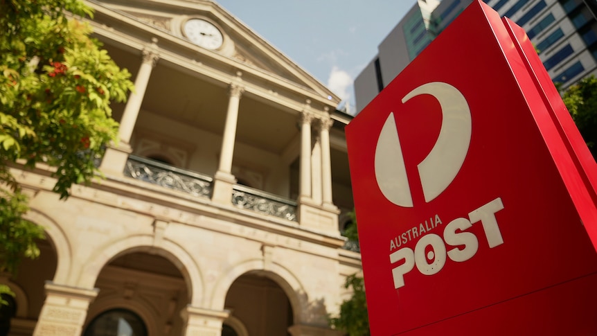 Red Australia Post sign outside Brisbane's GPO building in Queen Street in 2022.