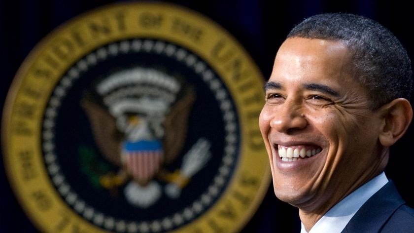 President Barack Obama smiles while speaking at an event in Washington, DC
