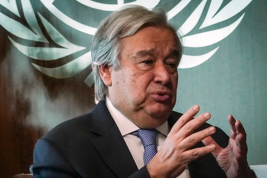 United Nations Secretary-General António Guterres gesturing.