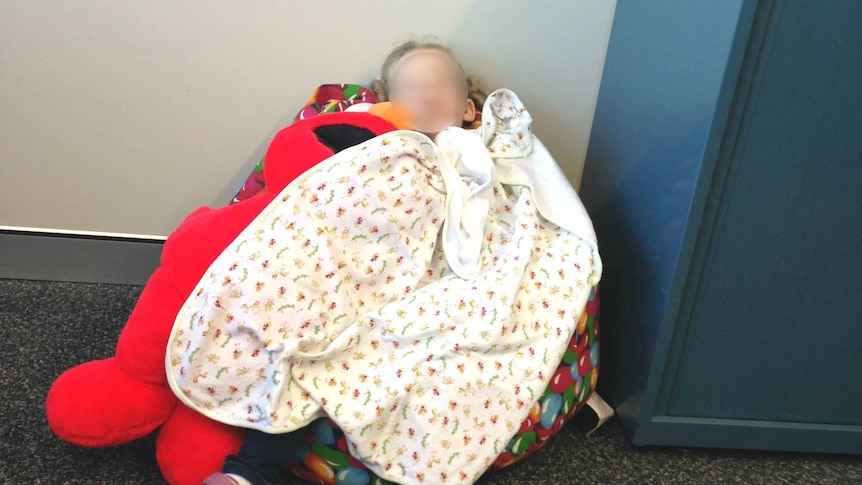 Child sleeping in office