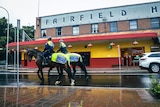 police on horses outside the fairfield hotel
