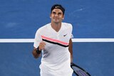 Roger Federer celebrates a point against Richard Gasquet at the Australian Open