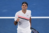 Roger Federer celebrates a point against Richard Gasquet at the Australian Open