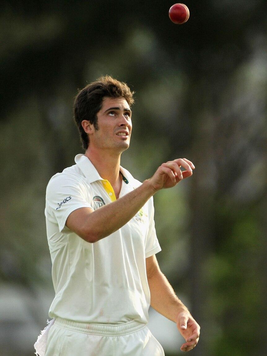 Ben Cutting walks back to his mark whilst bowling for Australia A