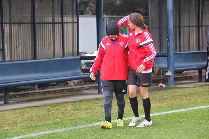 Two young women at a Football United event