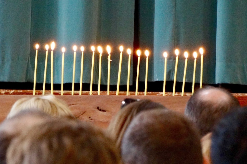 Lighted candles for victims of the Kerang train crash in northern Victoria in 2007 at a memorial service.