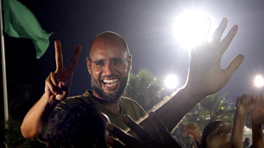 Saif al-Islam all smiles as he appears in his father's residential complex