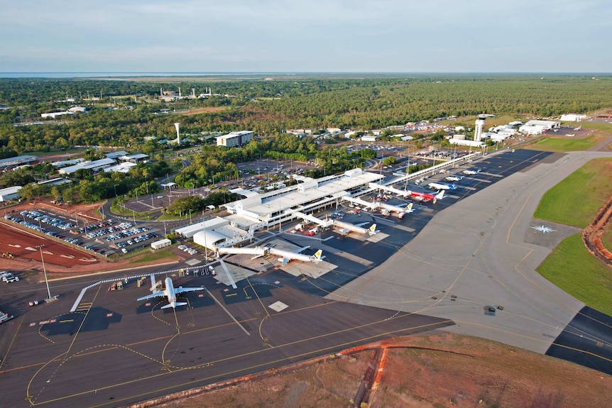 Aircraft sit at the gates of Darwin International Airport.