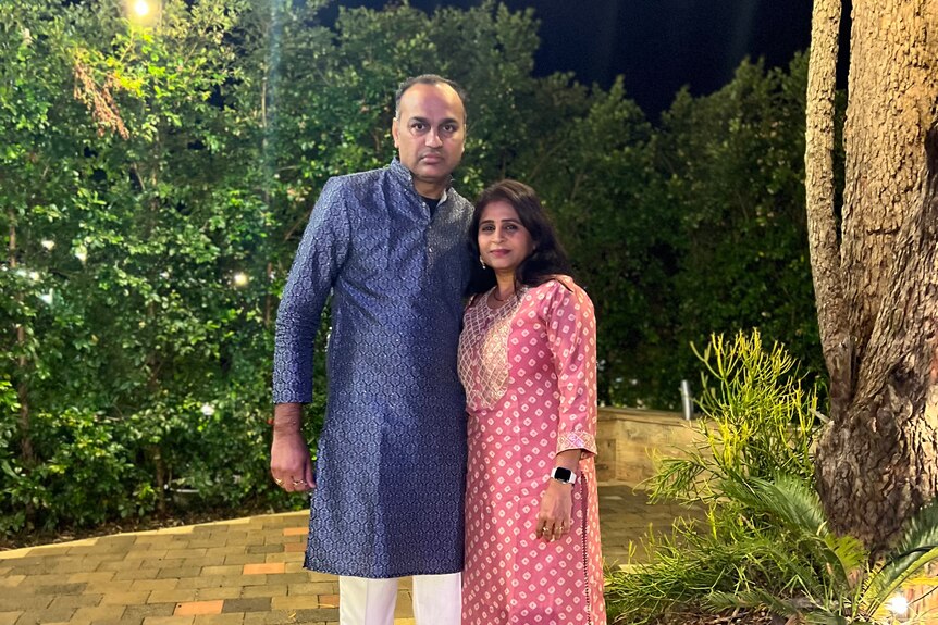 Yogita and Amit Patel wearing traditional Indian clothing.