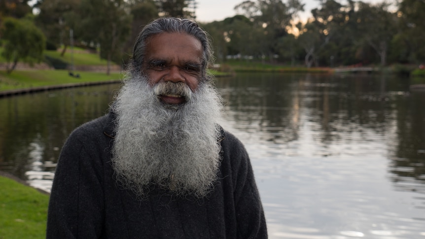 Stephen Goldsmith stands by the the banks of the Torrens River.