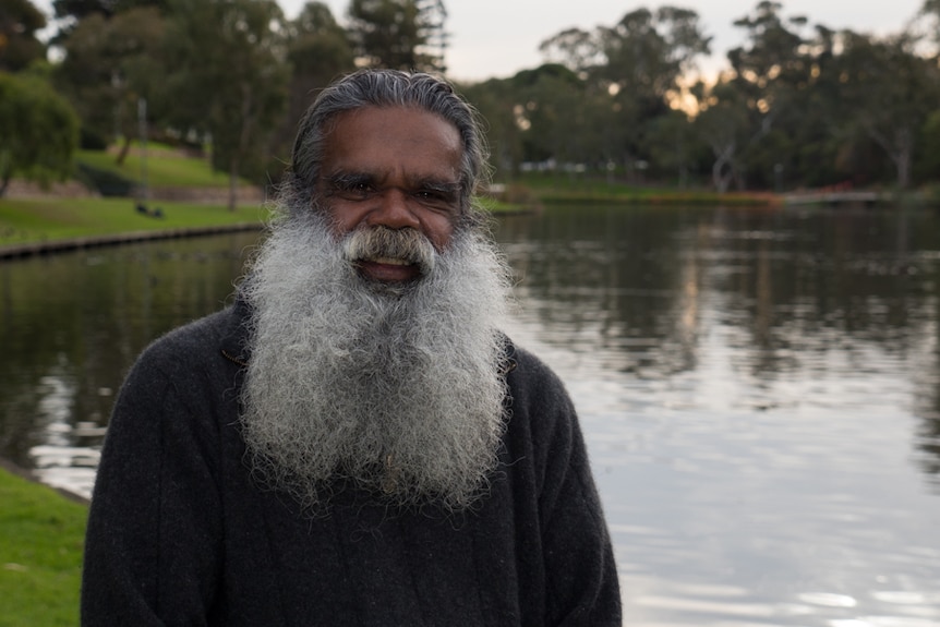 Stephen Goldsmith stands by the the banks of the Torrens River.