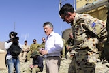 Stephen Smith and Angus Houston talk in Afghanistan