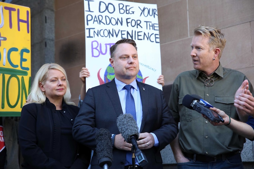 Brisbane's Lord Mayor Adrian Schrinner was heckled by climate protesters