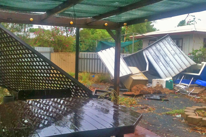 The backyard of a house in South Hedland is covered in debris resulting from Cyclone Heidi.