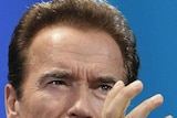 Arnold Schwarzenegger makes a point