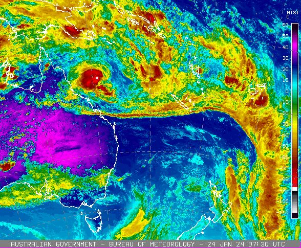A swirling red mass sits off the coast of Queensland in a false-colour satellite view of Australia.