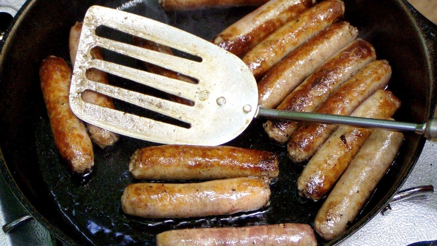 Sausages in a frypan.