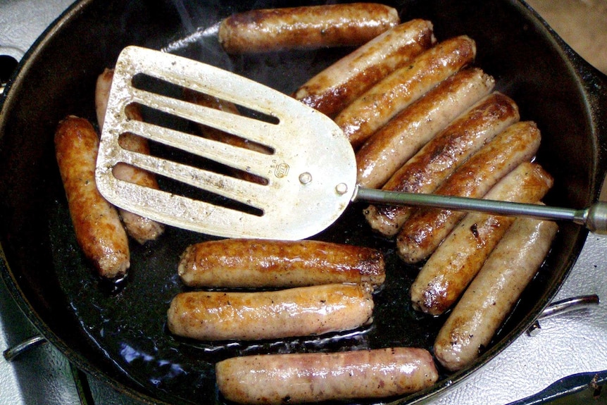 Sausages in a frypan.