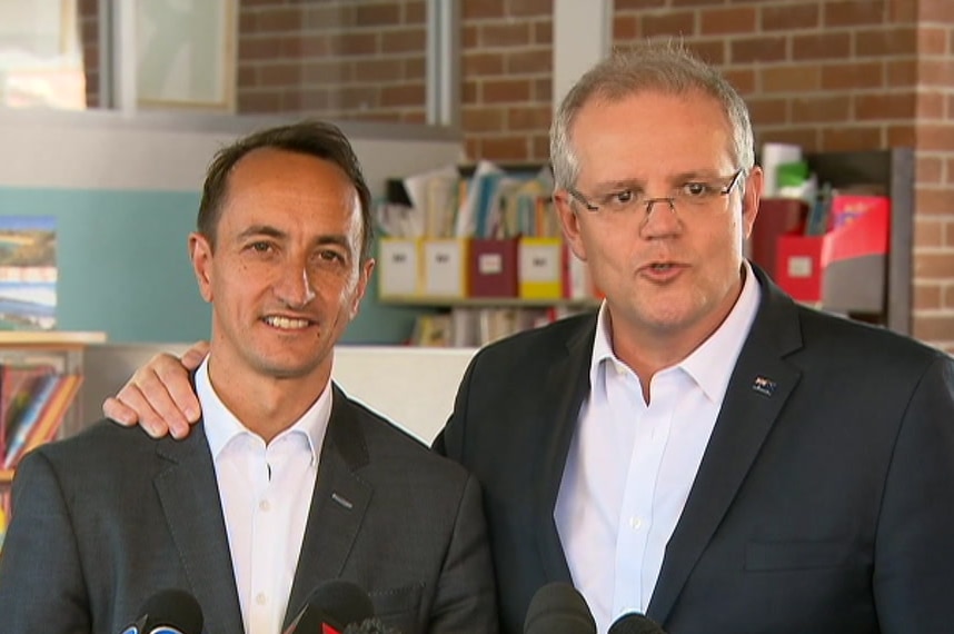 Prime Minister Scott Morrison with his arm around the Liberal's Wentworth candidate Dave Sharma