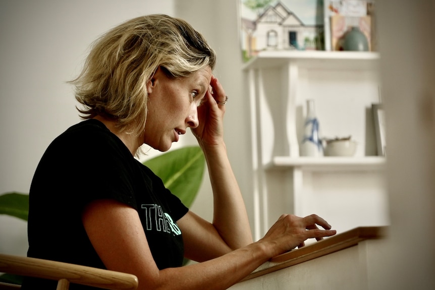 a woman looking stressed 